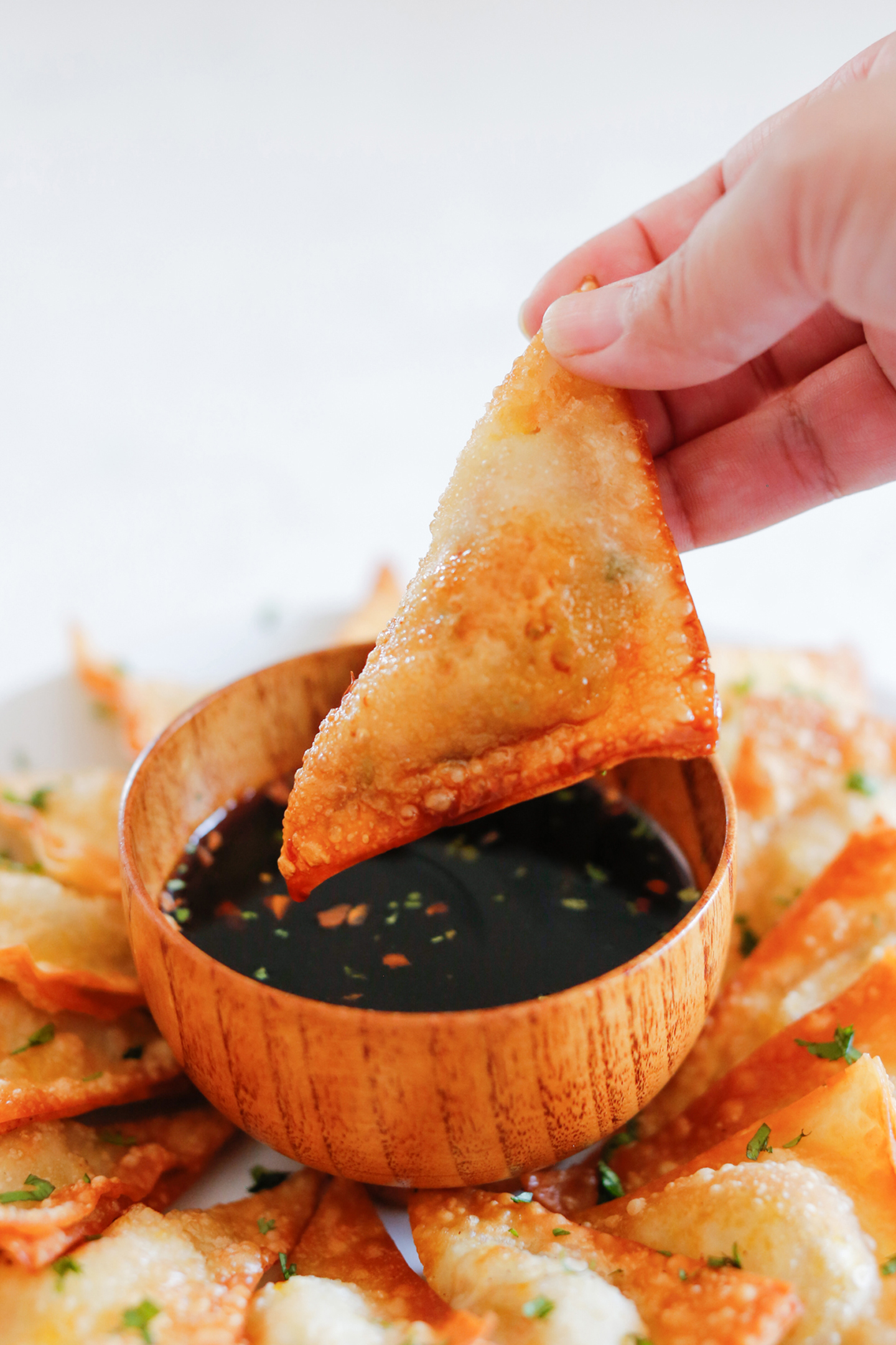crispy fried wontons and spicy soy dipping sauce